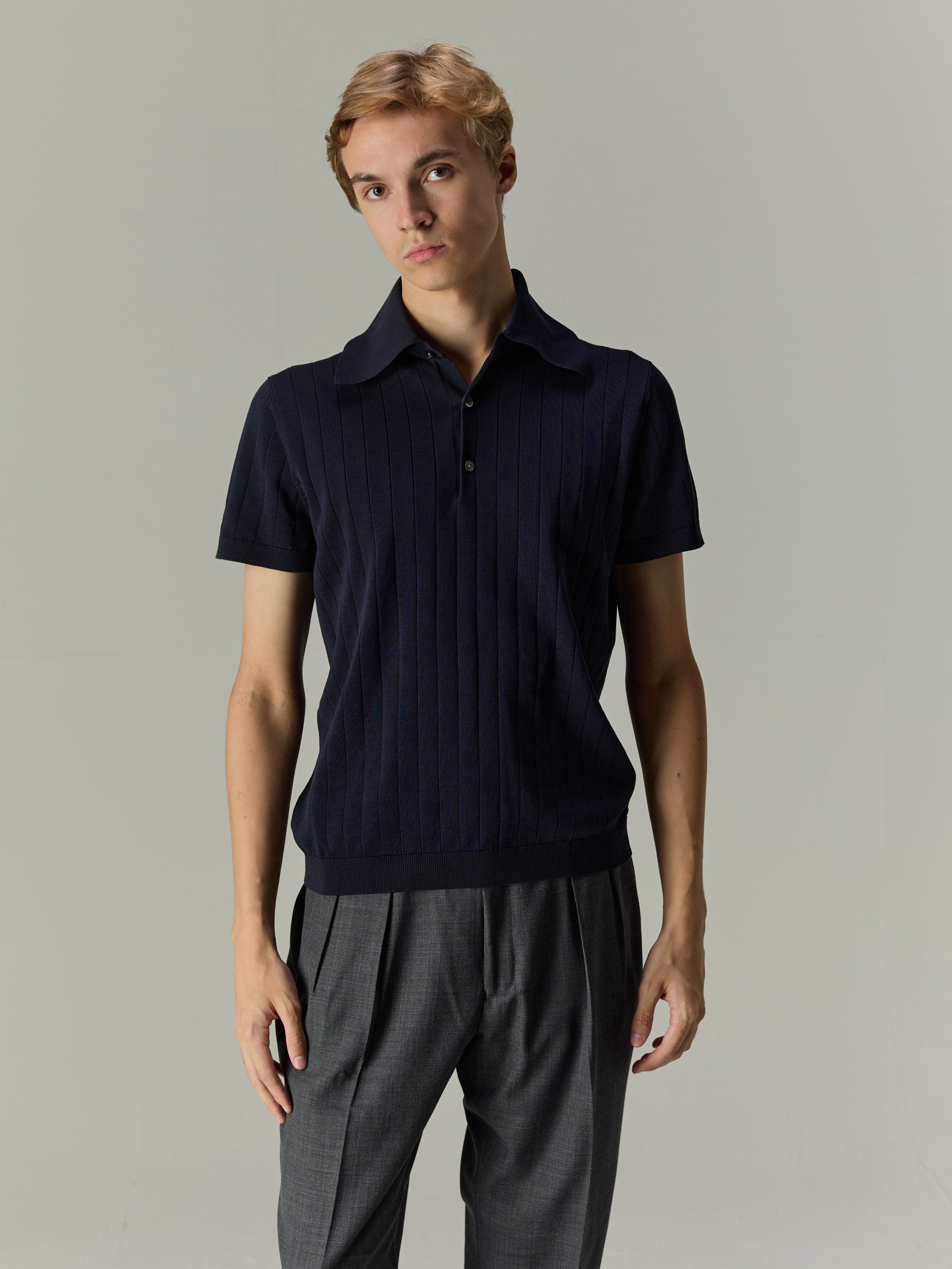 Navy — The Classic Polo, front view on model