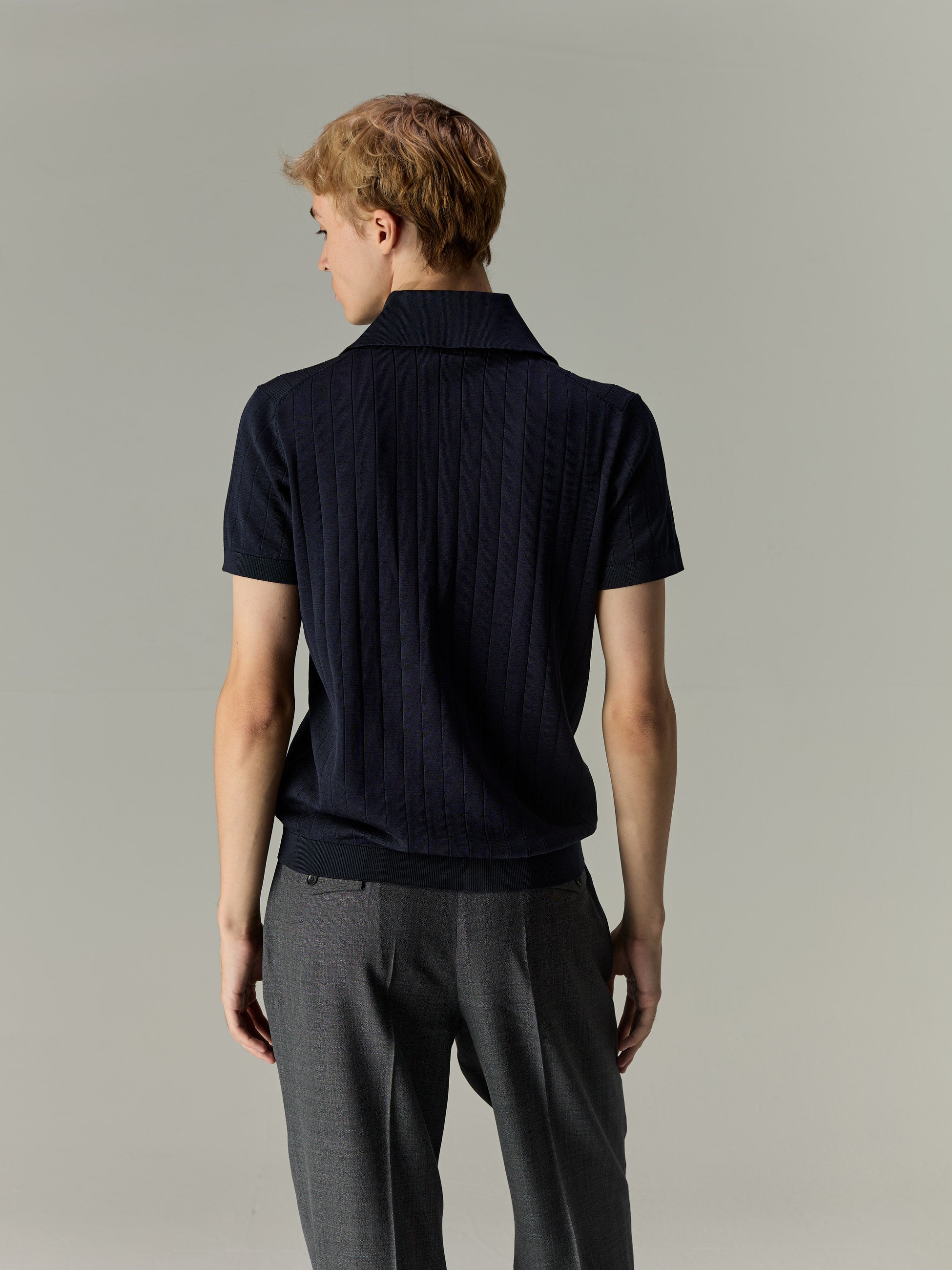 Navy — The Classic Polo, back view on model